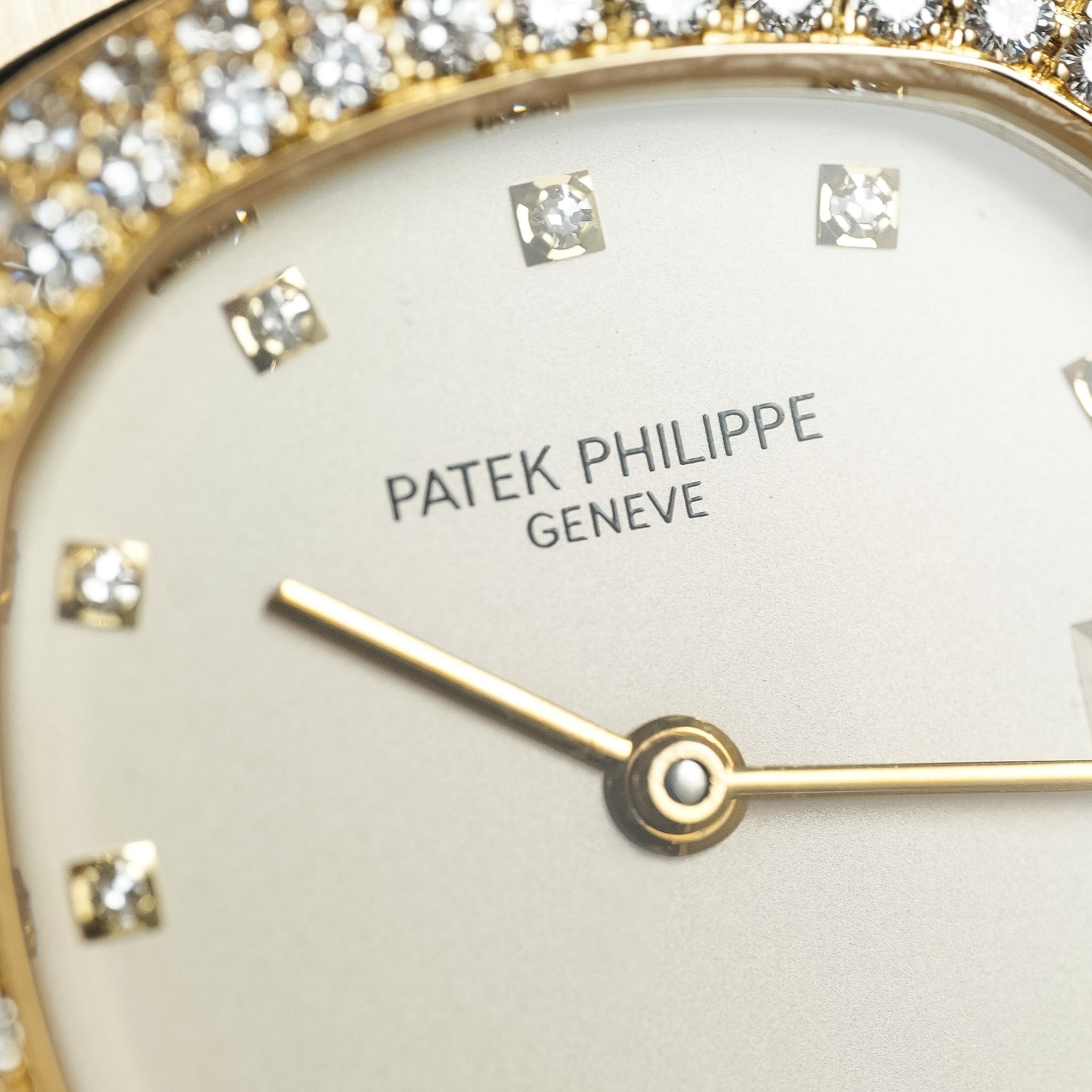 Patek Philippe watch face with diamond-studded bezel