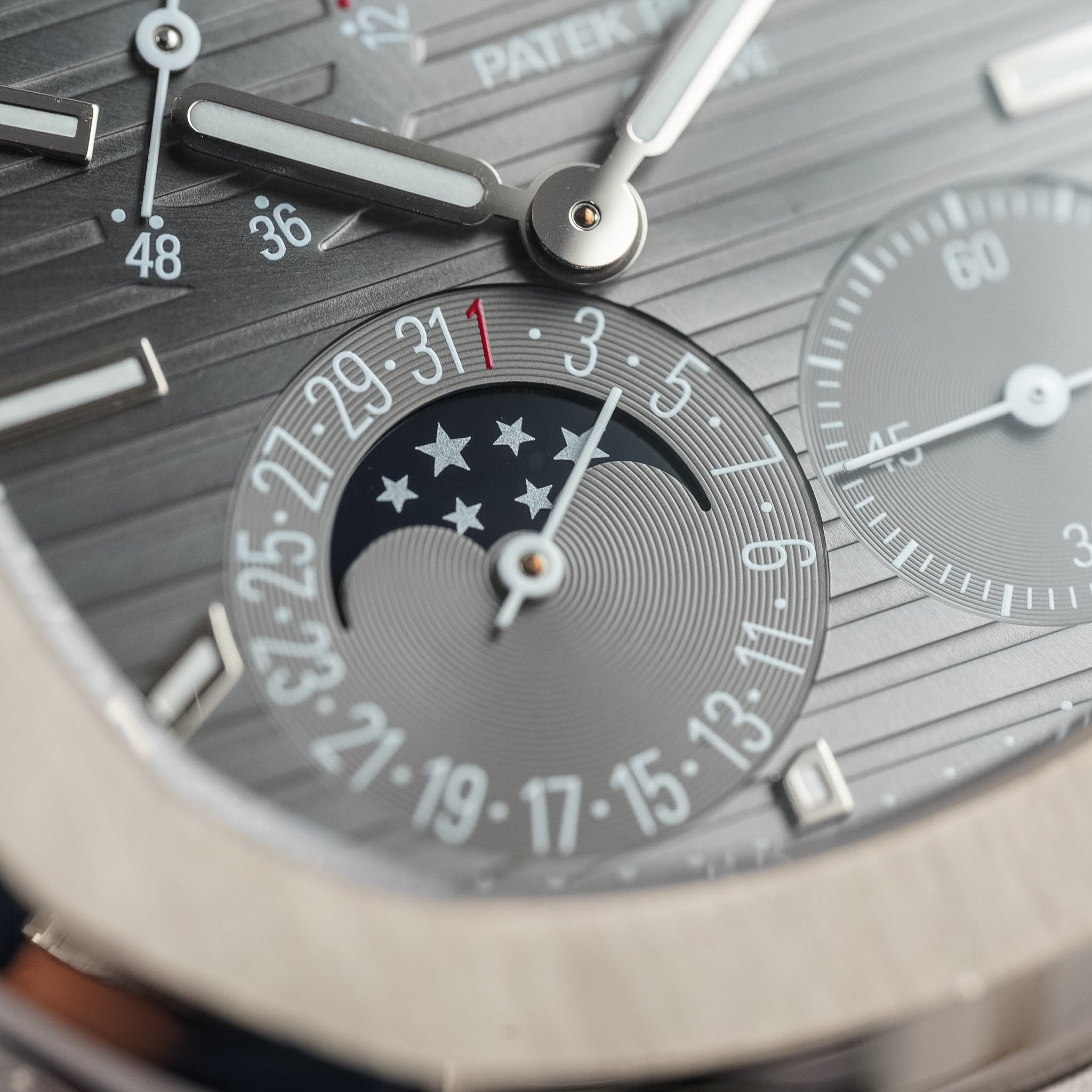 Close-up of a Patek Philippe watch face with detailed design