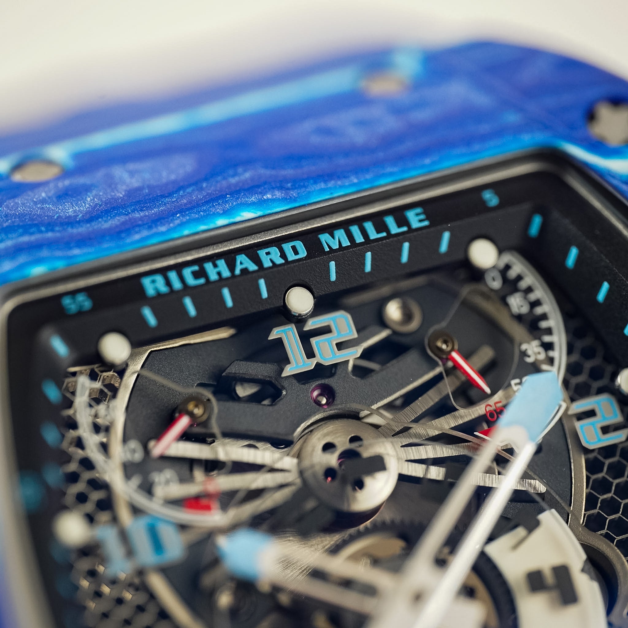 Closeup of a watch dial with the Richard Mille brand name