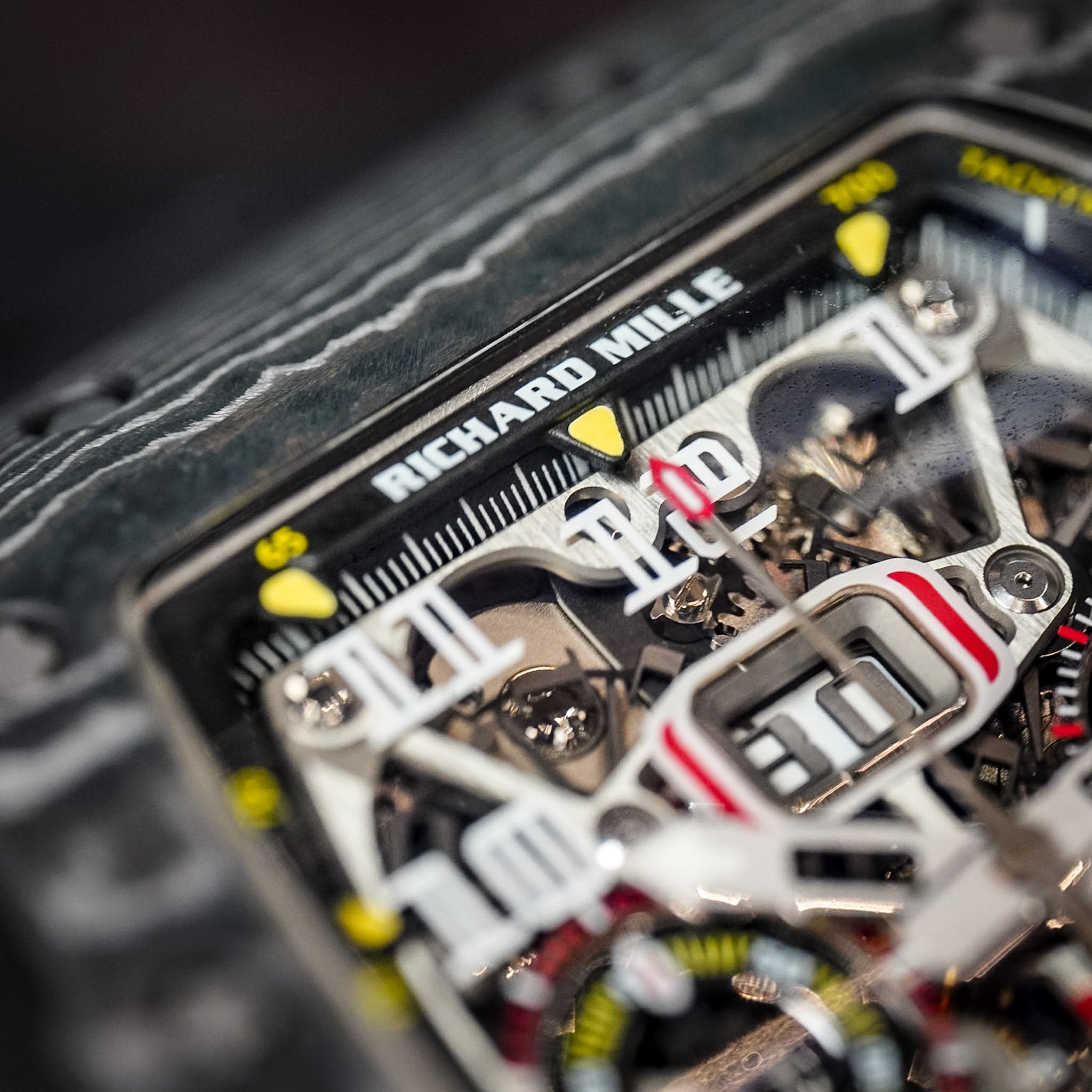 Close-up of a Richard Mille watch with intricate mechanical components.