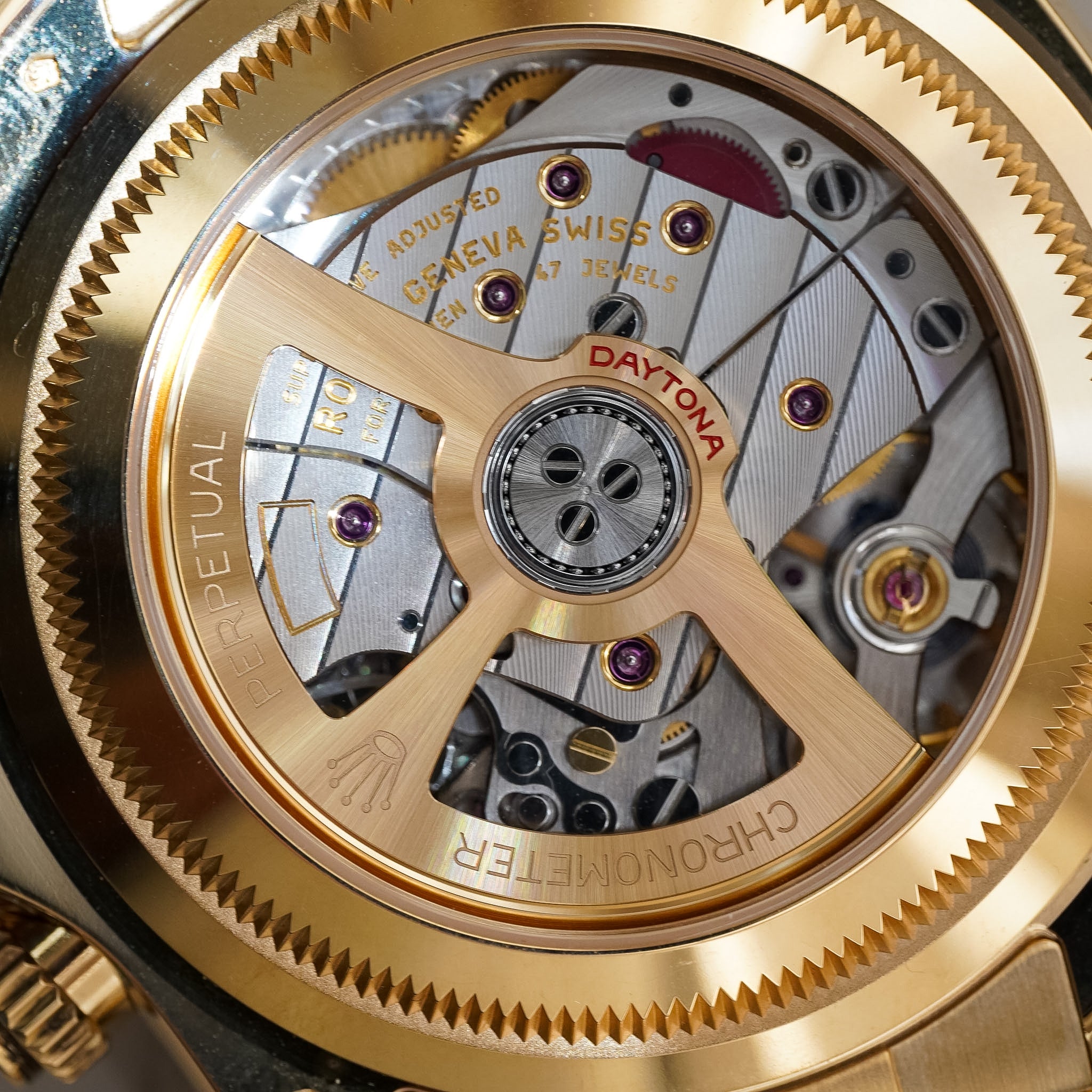 Display caseback of a yellow gold Rolex Daytona Le Mans