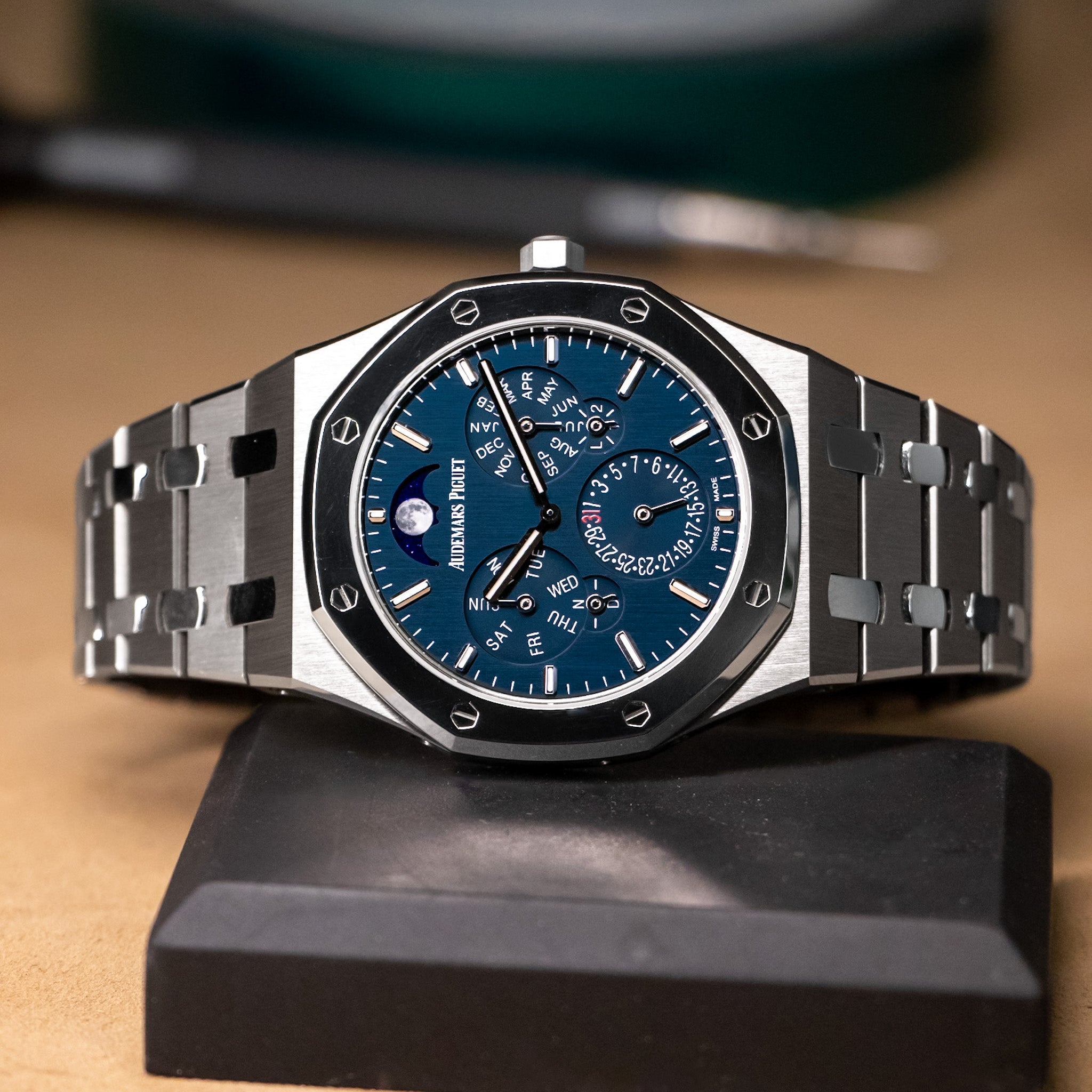 AP Royal Oak Perpetual Calendar RD#2 with a blue dial on a cream background at a sideway angle