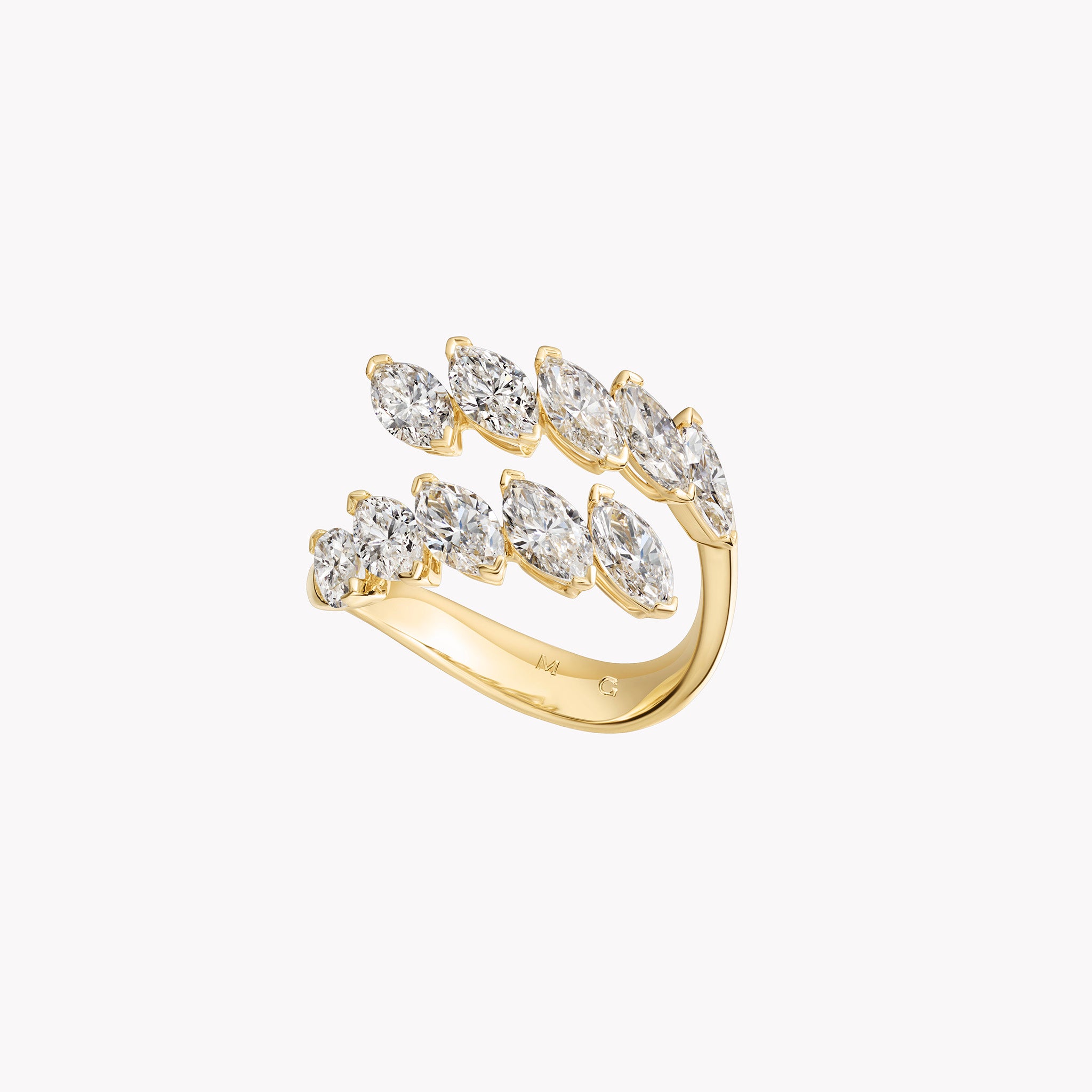 18K yellow gold marquise diamond twist ring with 3.17ct of marquise-cut diamonds.