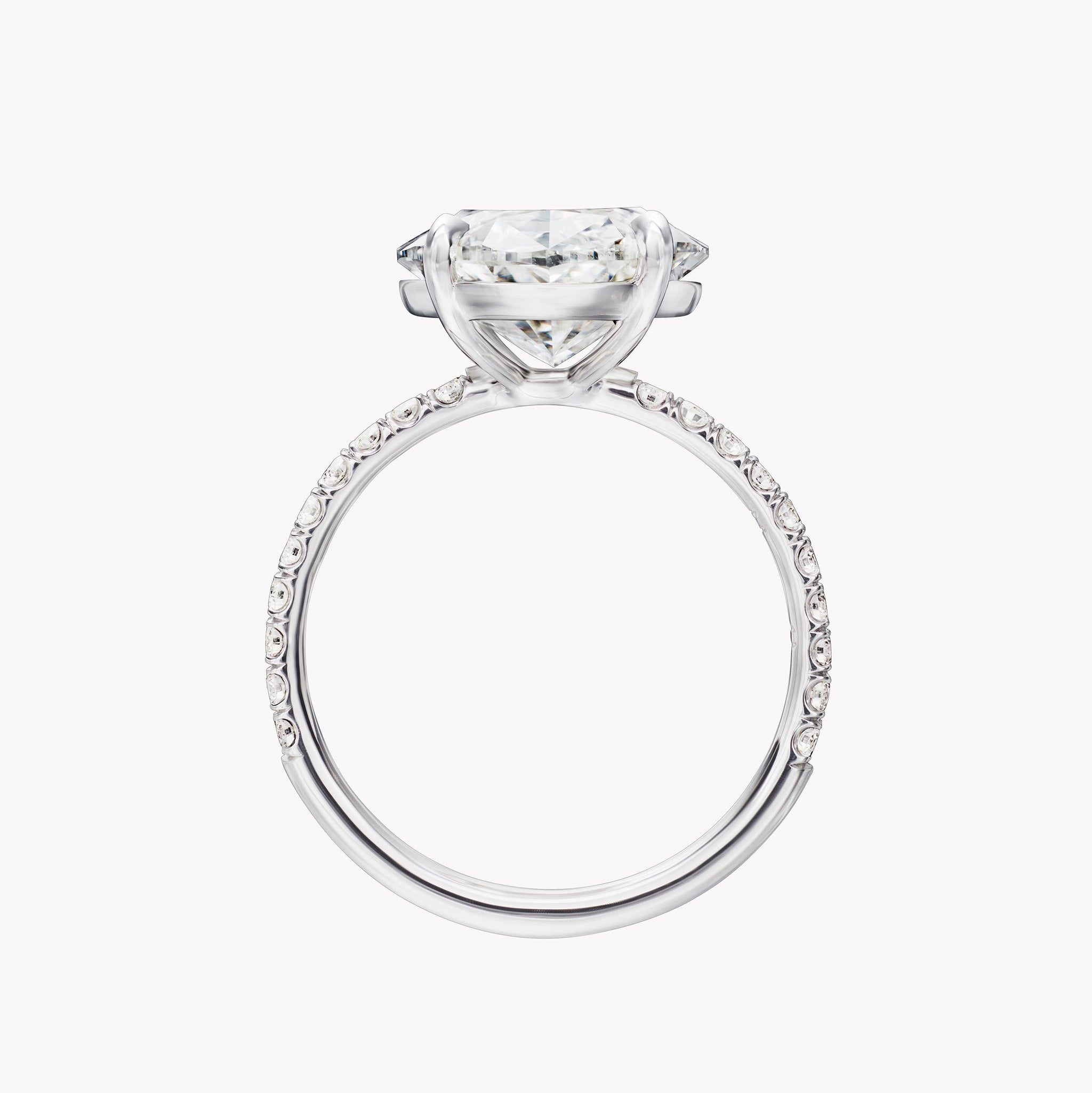 Oval Cut Solitaire Engagement Ring with Diamond Pavé