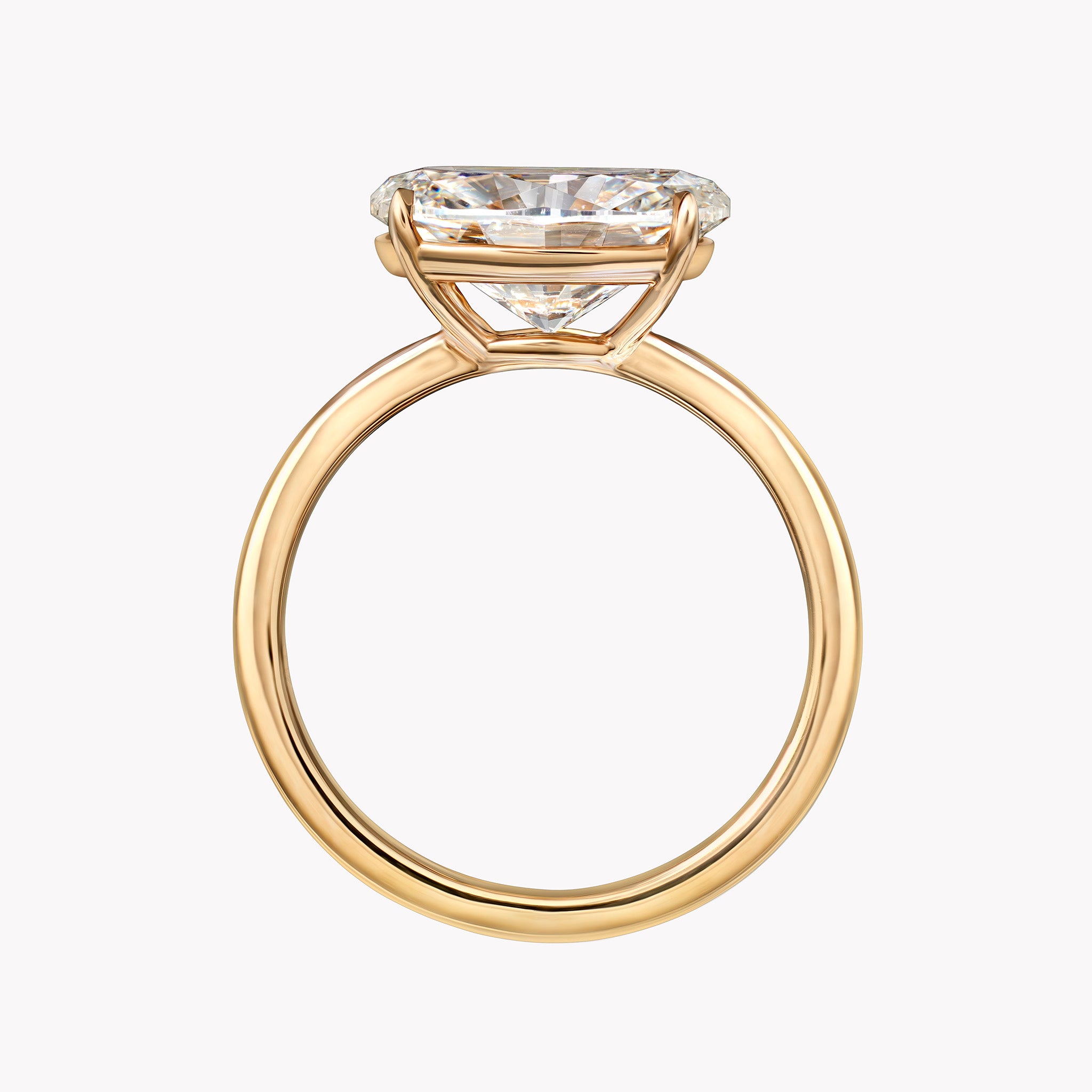East-West Oval Cut Solitaire Engagement Ring